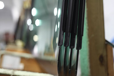 A photograph of Windshields in the Auto Glass division of Jackson Glass works